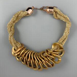 Gold mesh necklace with gold lobster clasp and a series of interlocking gold twisted circle features