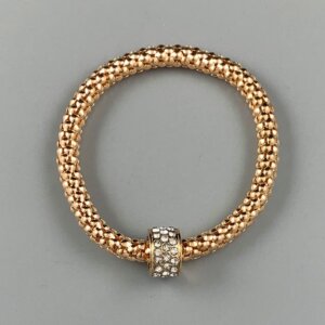 Ice gold coloured bracelet with crystal studded cuff.