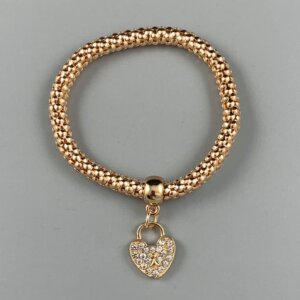 Capture gold coloured bracelet with crystal studded padlock pendant.